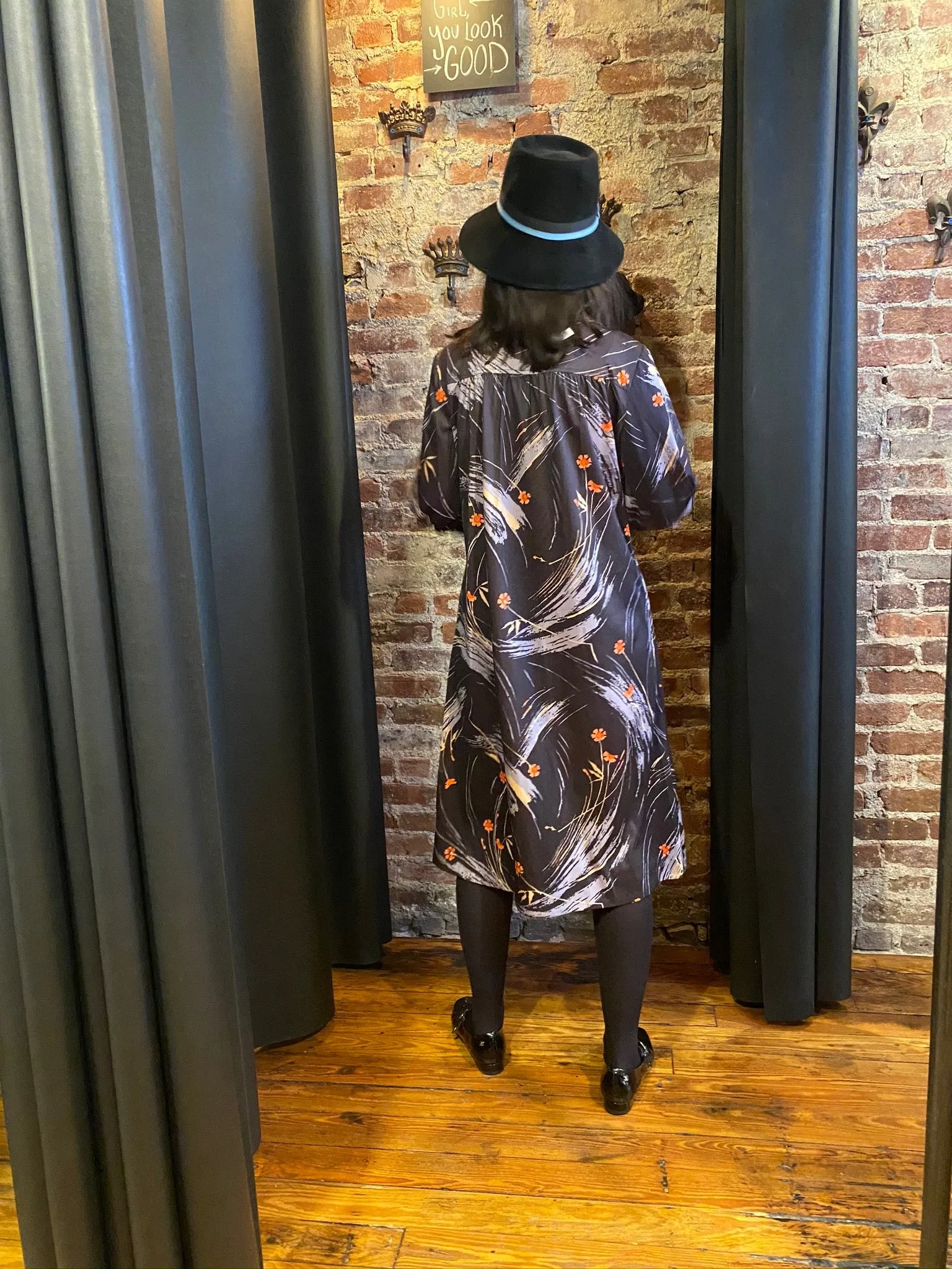 Black abstract dress with bow