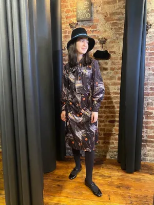 Black abstract dress with bow