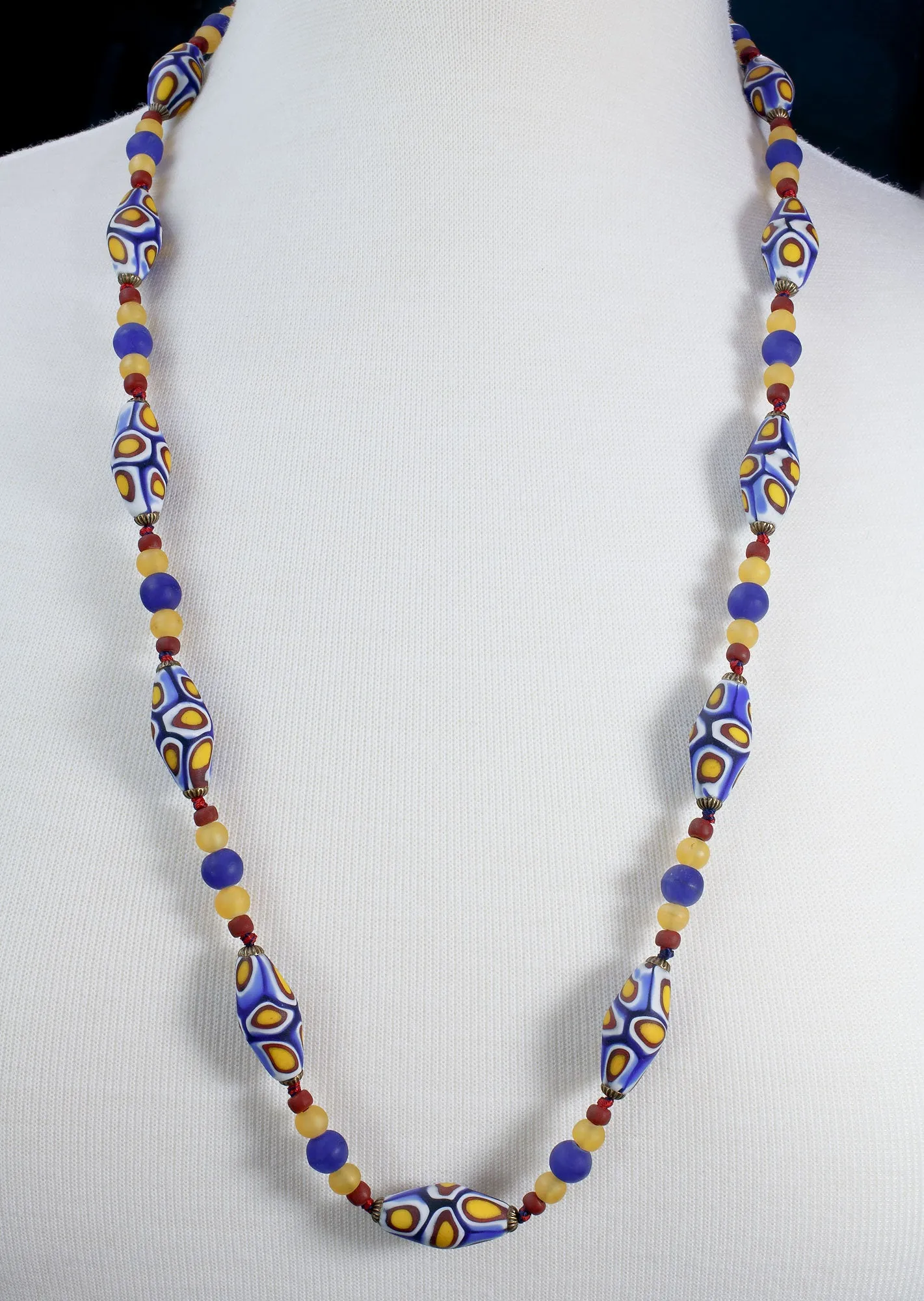 Millefiori Bead Necklace, blue, yellow and red, matte glass ovals. 28 inches. j-nlbd1288